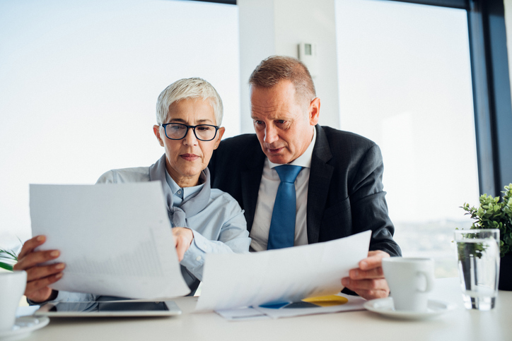 A couple reviewing their retirement plan.