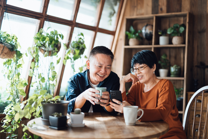 A couple reviews their tax return, having filed health savings account tax form 8889. 